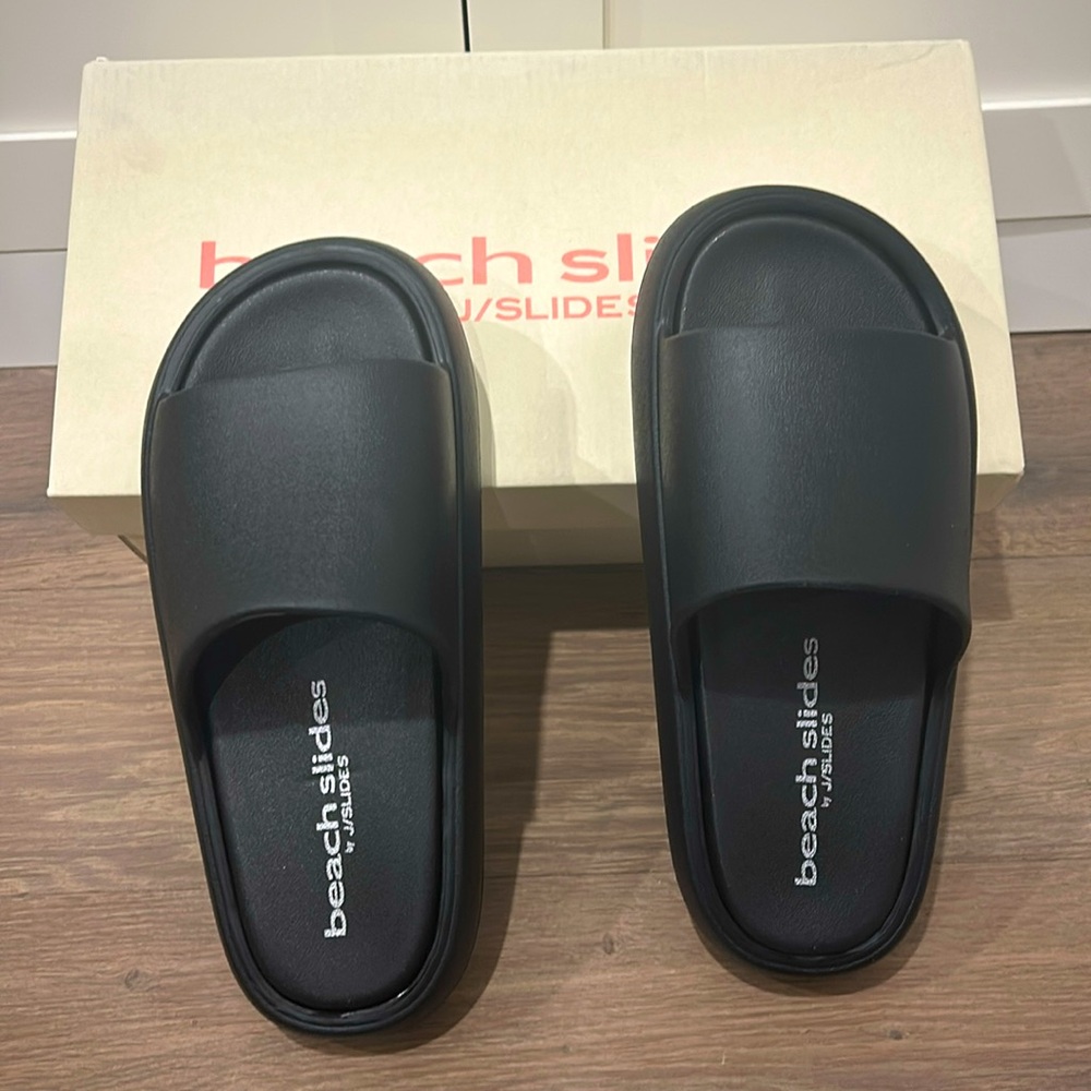 Brand new in the box black Eva squish beach slides by J/Slides, size 7